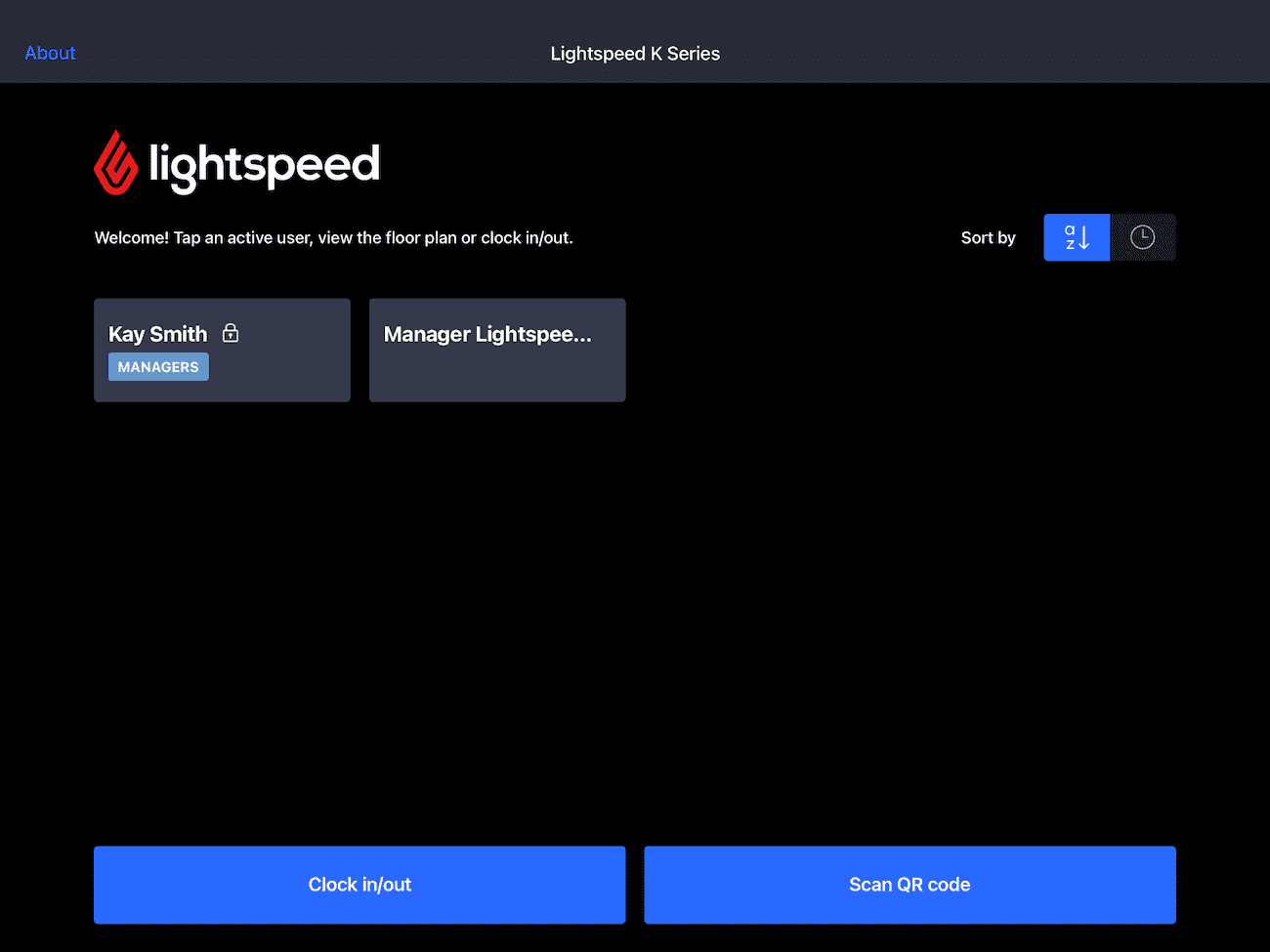 Image displays the login page for Lightspeed POS. There are two blue buttons on the bottom of the screen, one is titled 'Clock in/out' and the second is titled 'Scan QR code.'