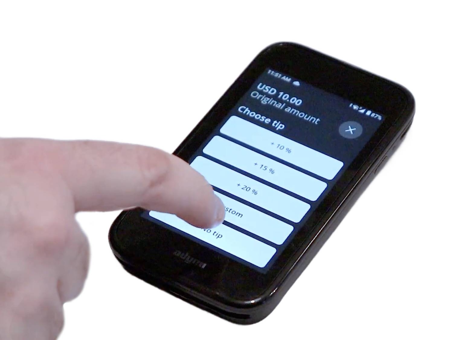 A payment terminal with customer's finger selecting a tip.