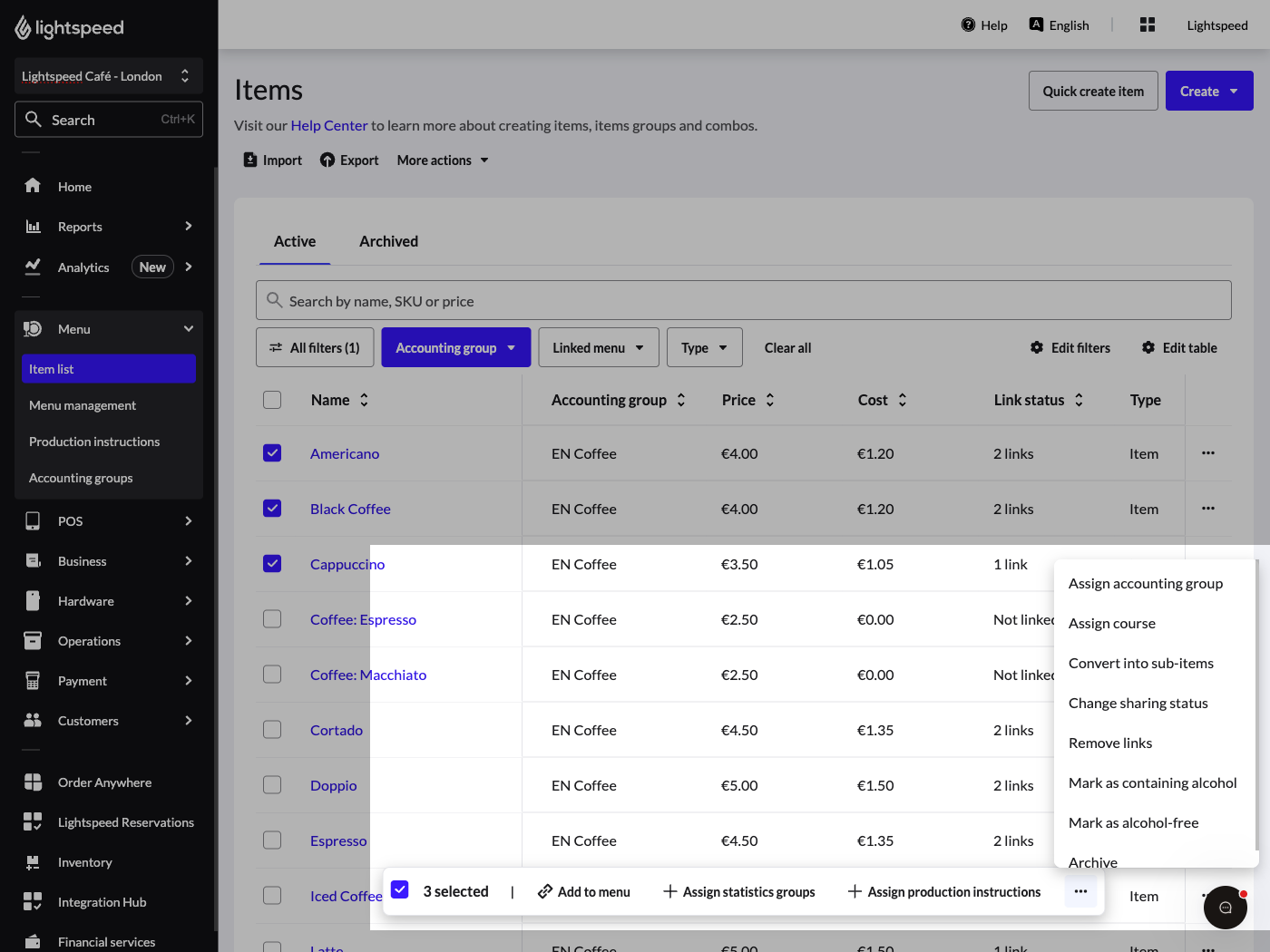 Items page with multiple items selected, showing the actions menu with "Assign accounting group" as an option.